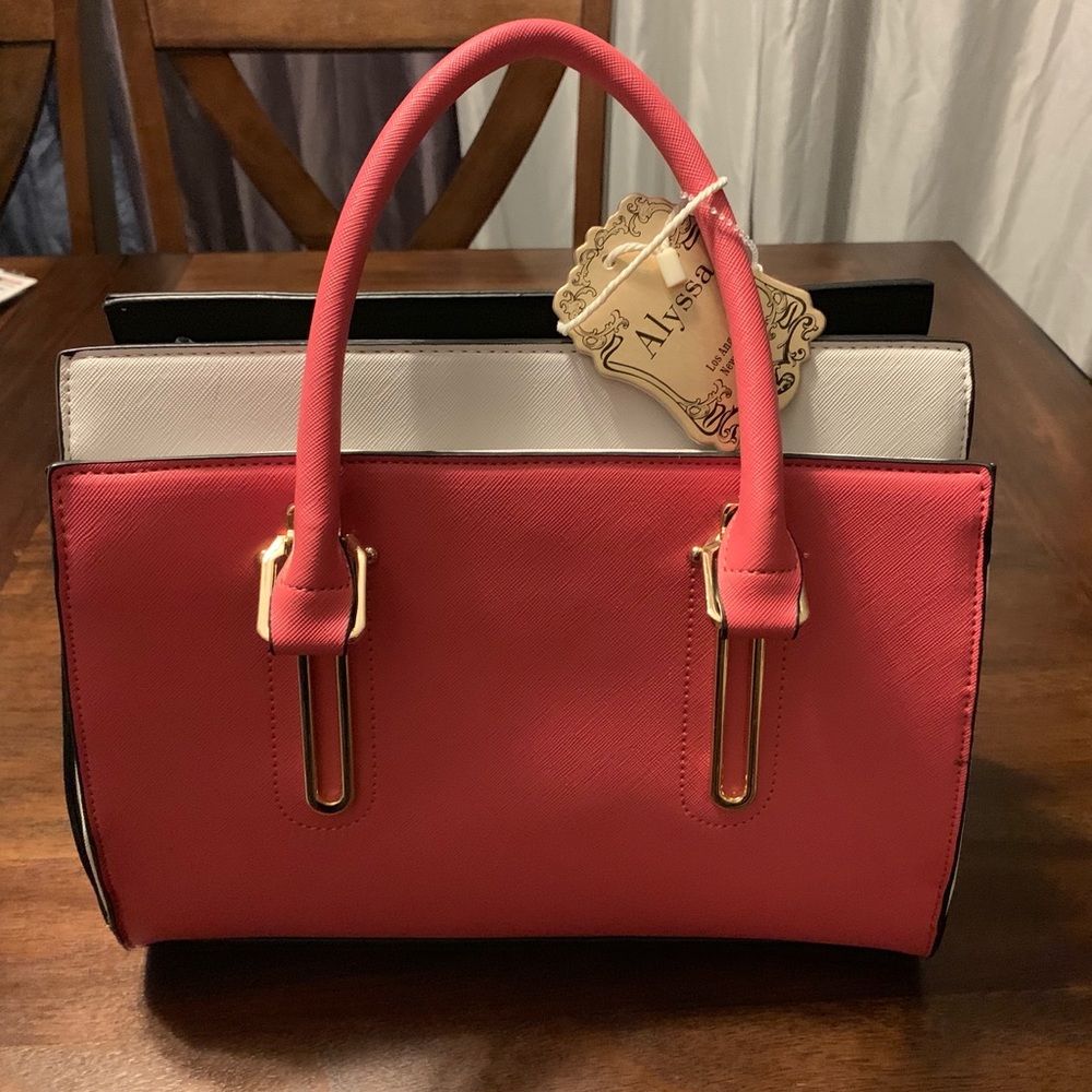Brand new vegan handbag. Pink white and black.